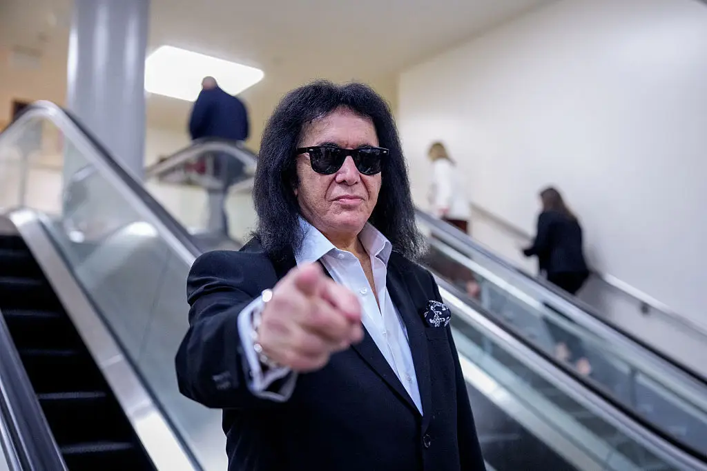 Gene Simmons has told his fellow celebs to bite their tongues when it comes to speaking out about politics... despite having previously spoken about politics publicly himself (Andrew Harnik/Getty Images)