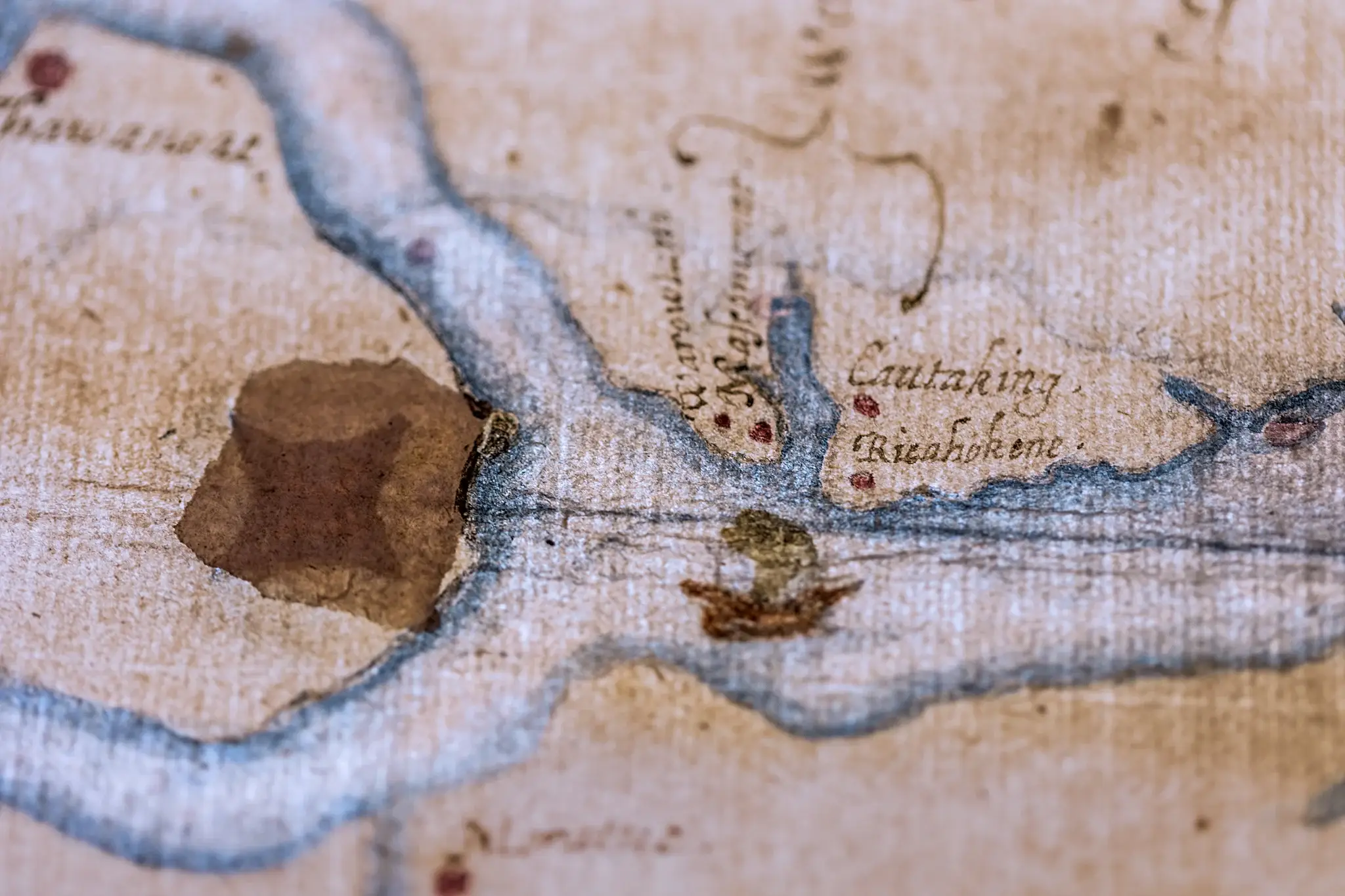 This 16th-century map of what is now coastal North Carolina appears to show a fort concealed under a patch and visible only by backlighting (British Museum) 
