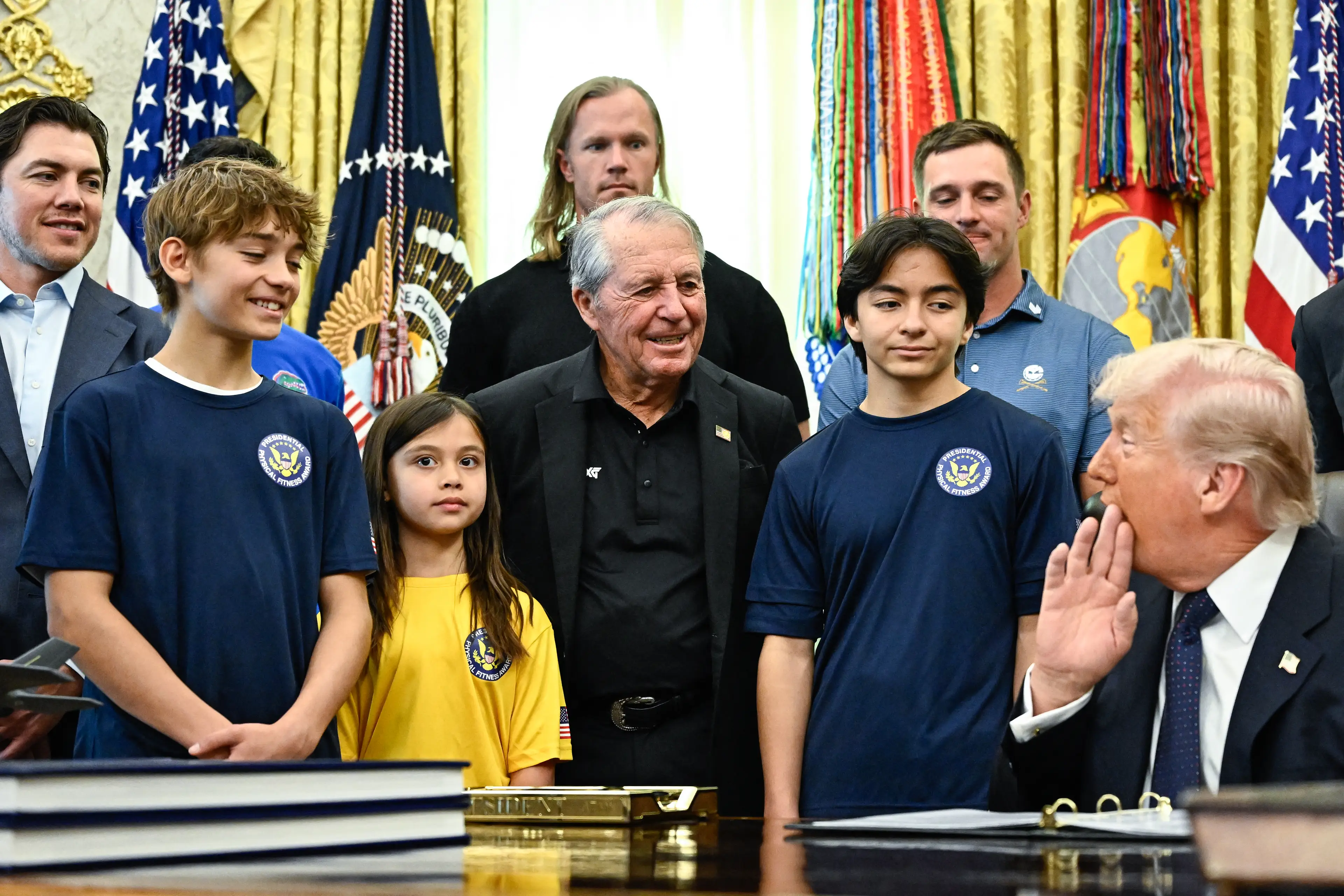 The POTUS has been criticized for sharing graphic details about the Iran war in front of the young students (Kent NISHIMURA / AFP via Getty Images)