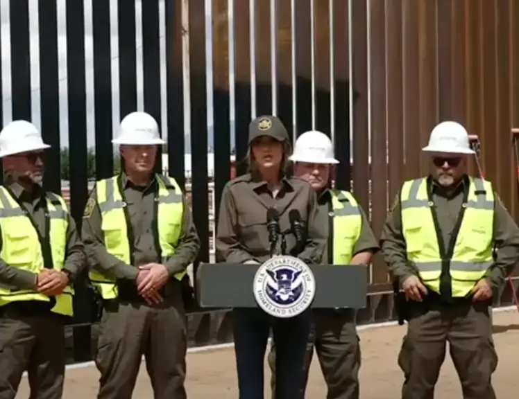 Kristi Noem was seen putting on some paint on the border wall herself (LiveNowFox/YouTube)