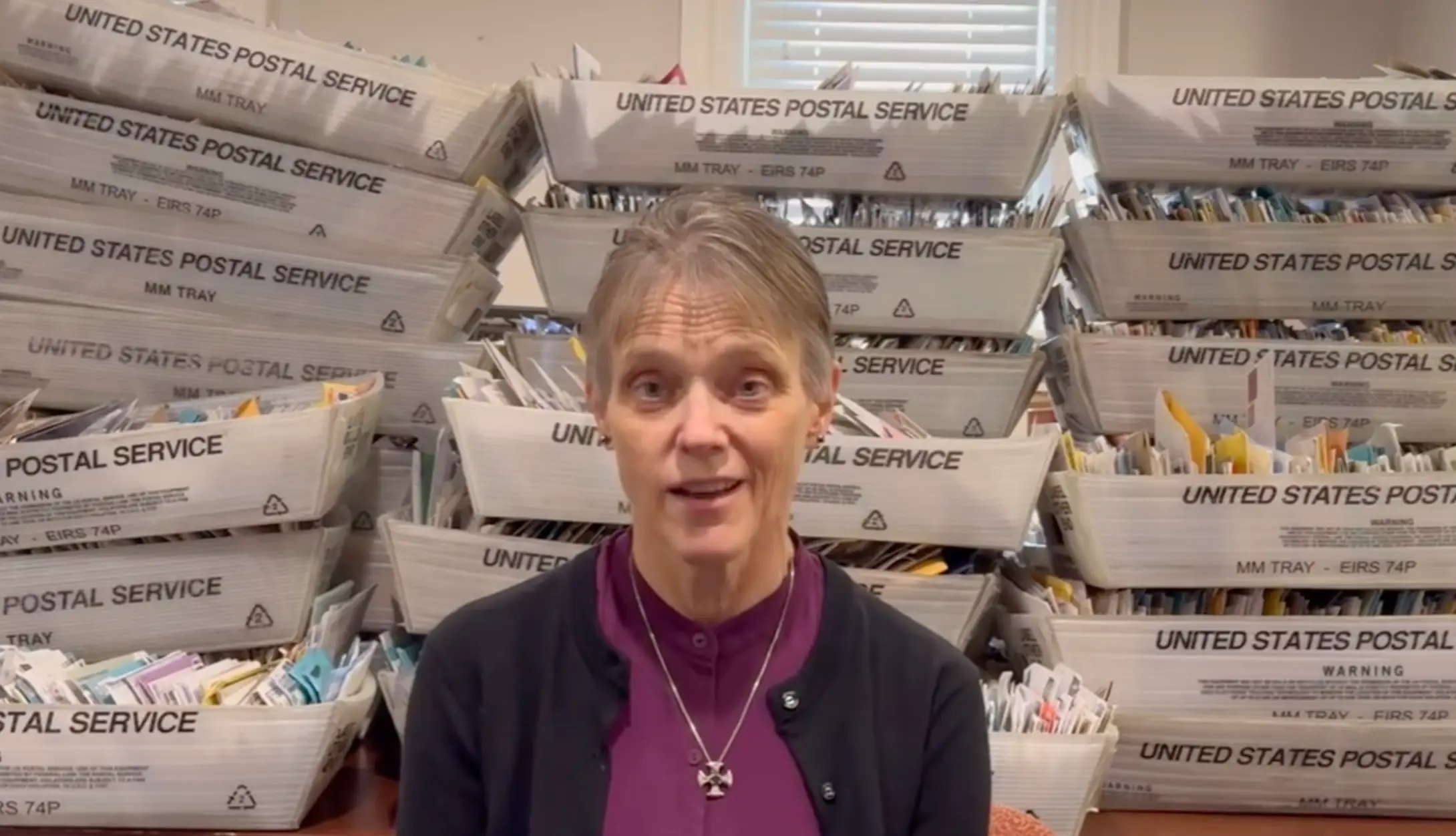 In her new message, the bishop sat in front of a pile of fan mail she had received (Instagram/@mariannbudde)