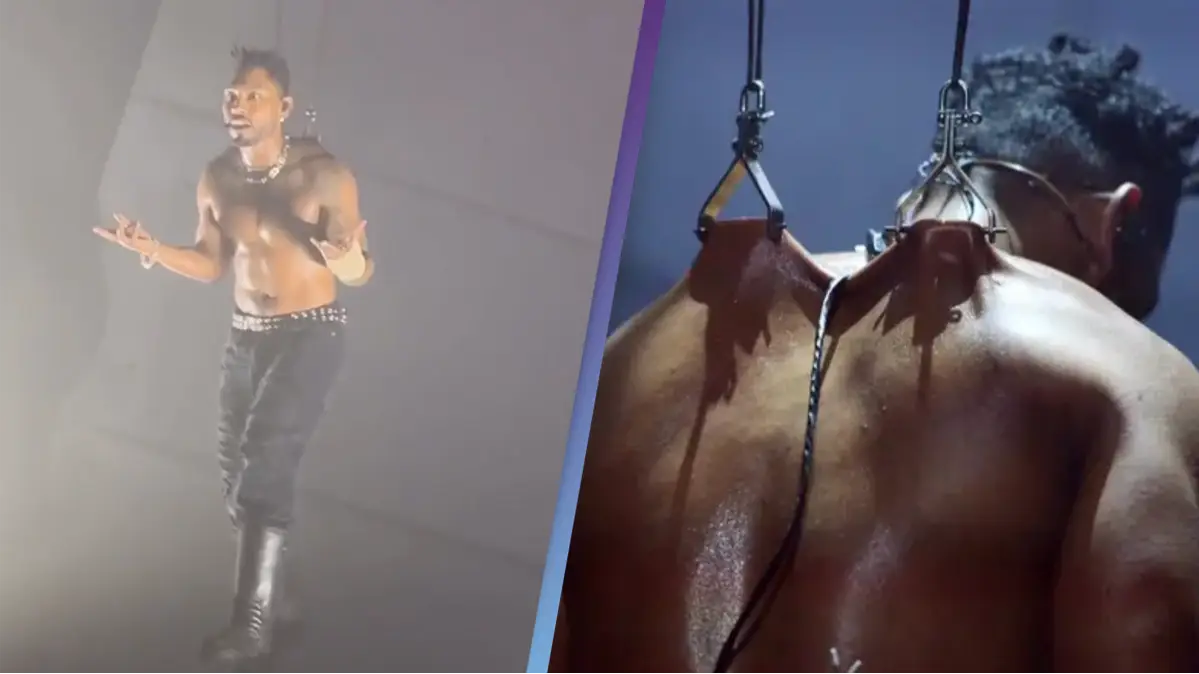 Miguel pierces his back with metal hooks hanging on his bare skin for shocking performance