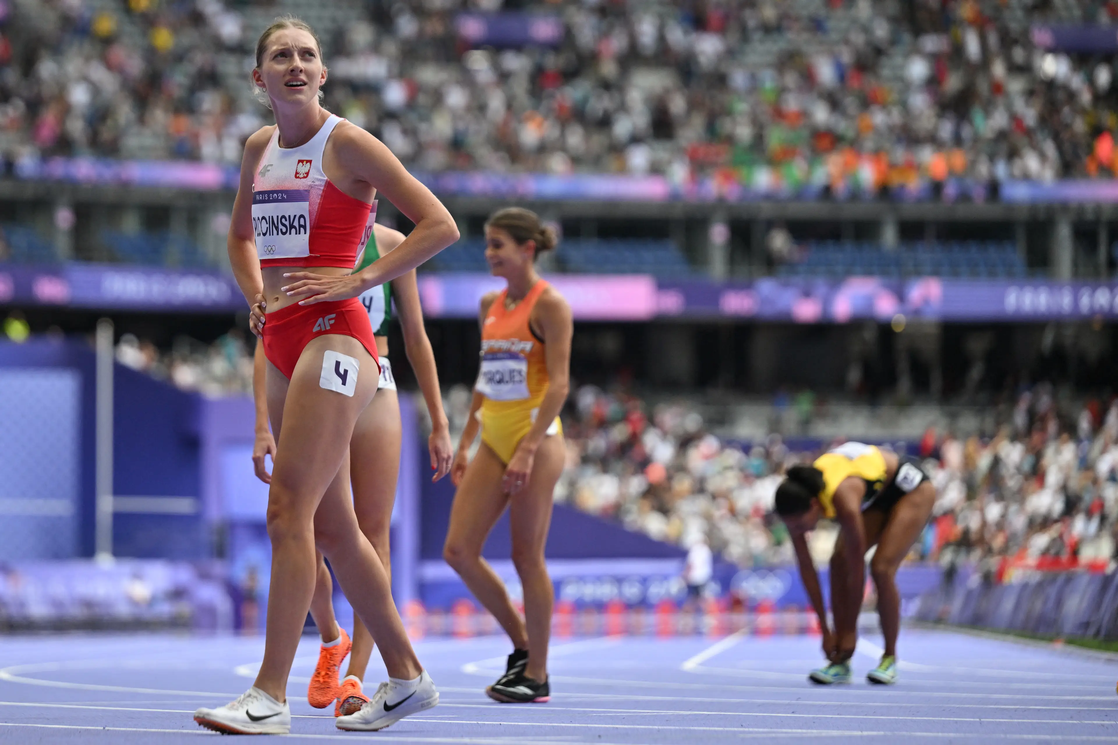The repechage round can run the risk of tiring out athletes. (JEWEL SAMAD/AFP via Getty Images) 