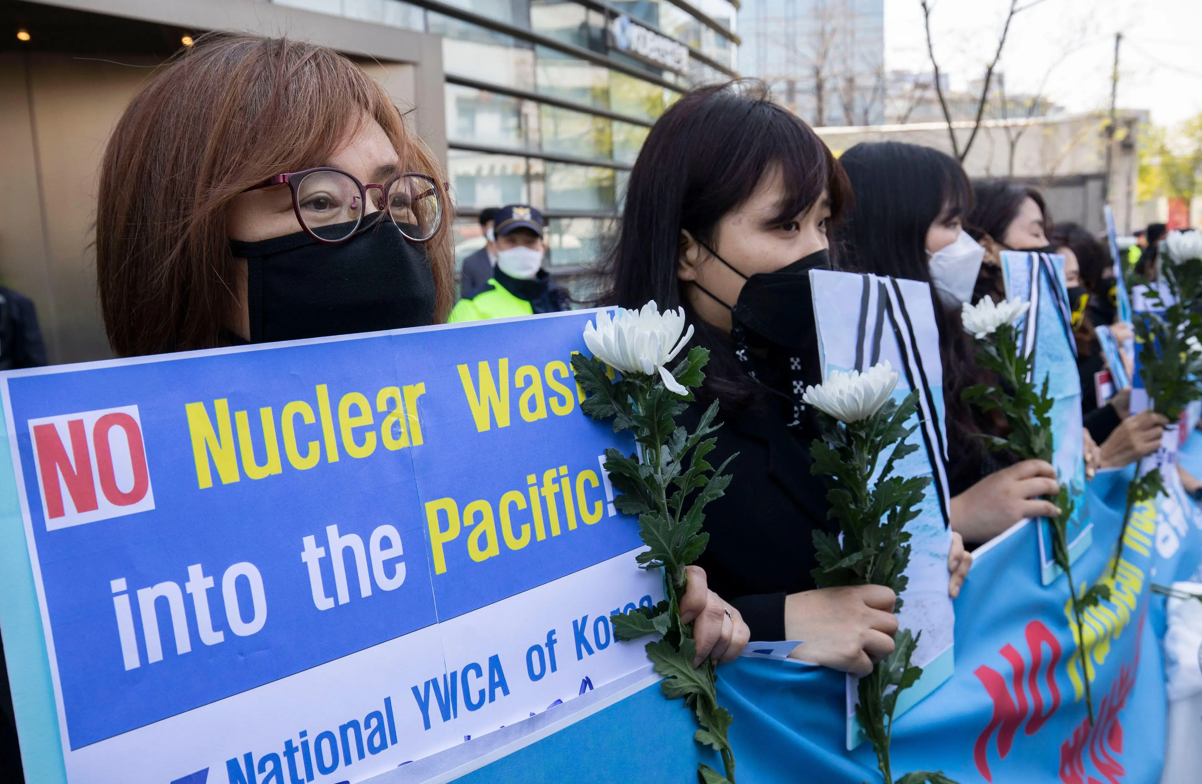 South Korean members of Women's Christian Association Korea stage a rally to denounce the Japan government's decision on Fukushima water.