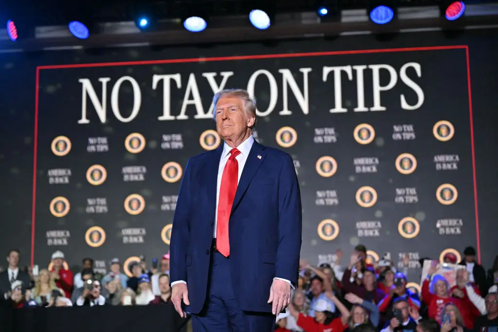 Trump has promised to slash taxes on tips for service workers (MANDEL NGAN/AFP via Getty Images)