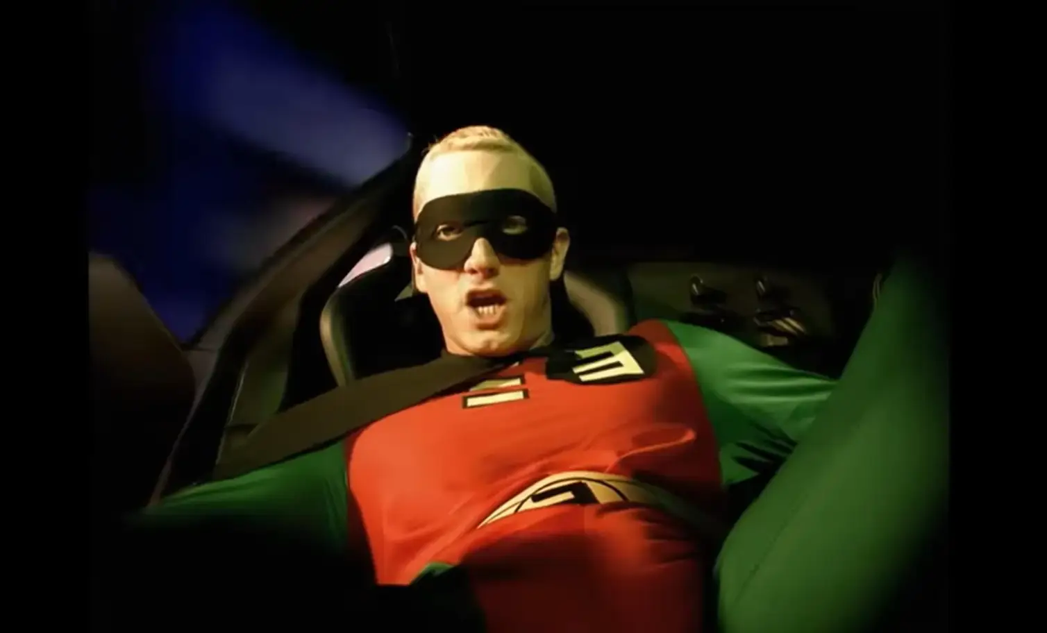 An unorthodox crotch shot also returns. (Eminem/YouTube) 