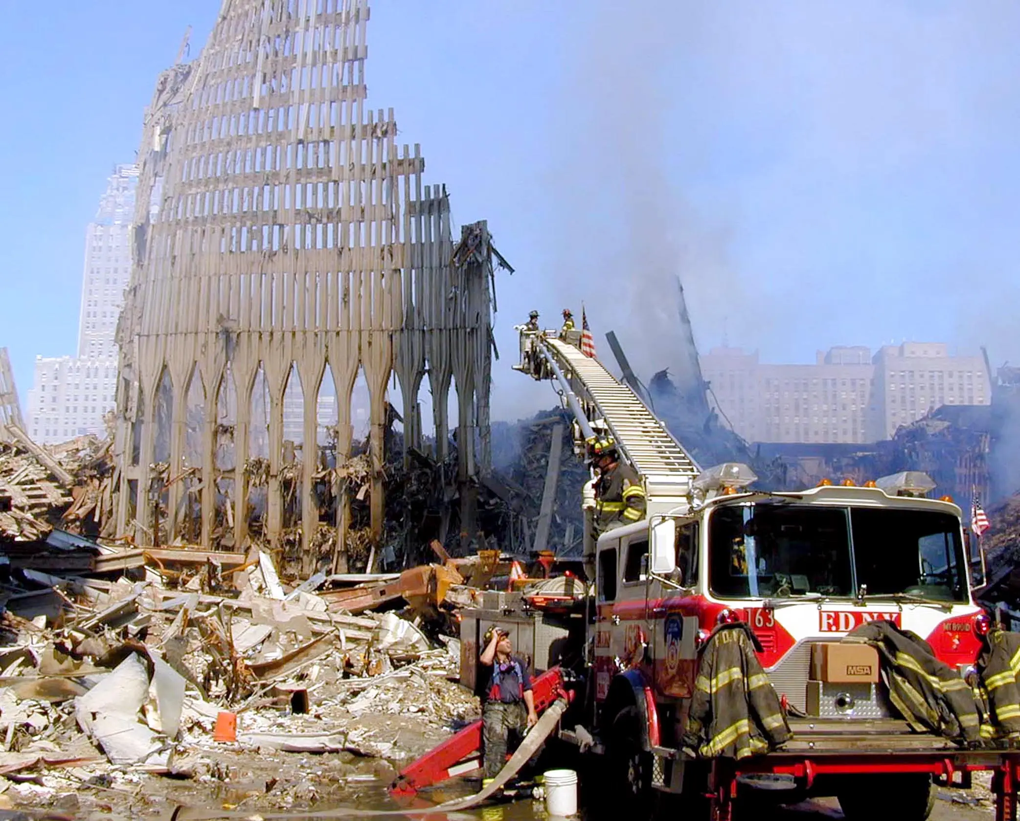 Firefighters worked to find survivors and clear rubble from the scene (Michael Rieger/Greg Mathieson/Mai/Getty Images)