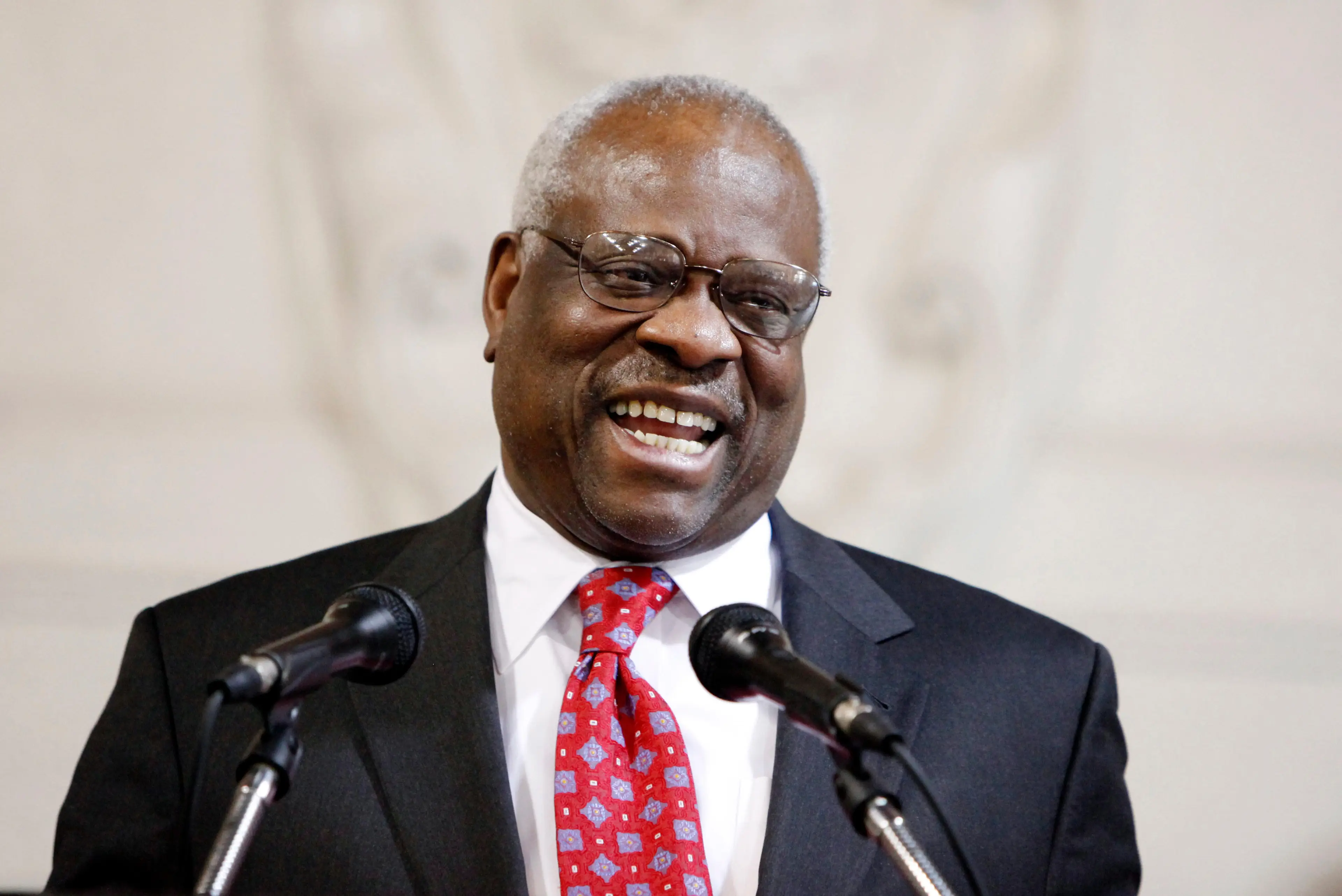 Protesters gathered outside the home of Clarence Thomas.