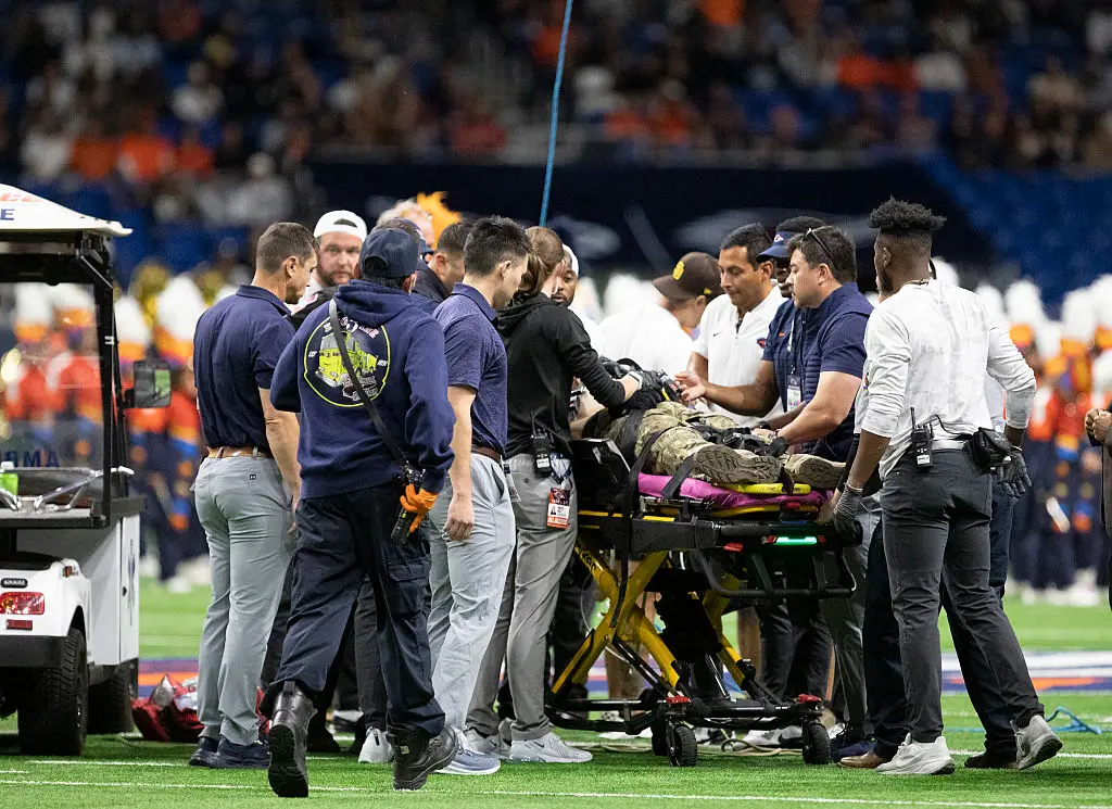 Emergency responders tend to a service member after an accident repelling from the roof before a football game against Navy at the Alamodome, Saturday, October 17, 2026. (Getty Images/ San Antonio Express-News/Hearst Newspapers)
