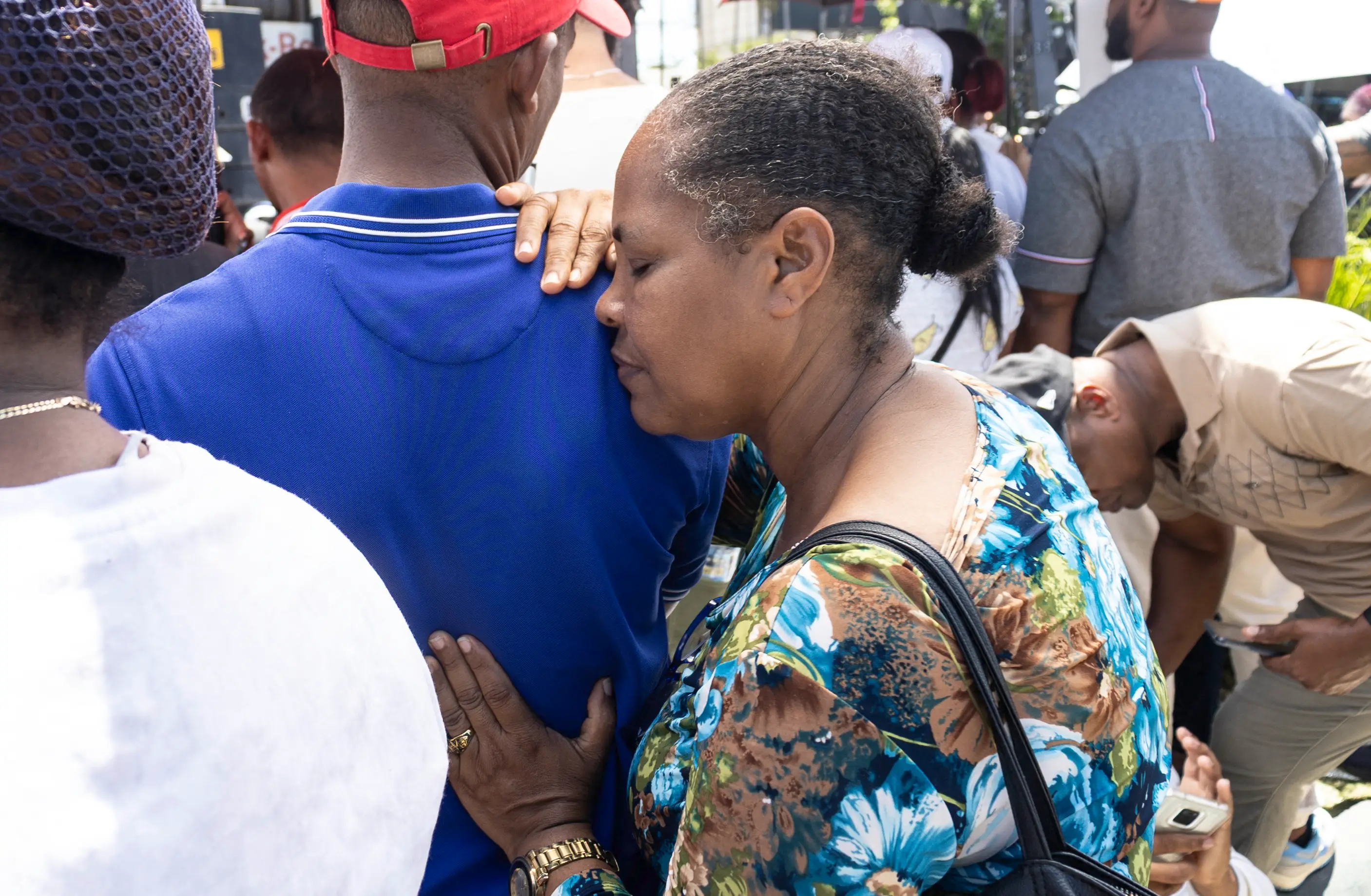 People have been praying outside the club (ERICKSON POLANCO/AFP via Getty Images)