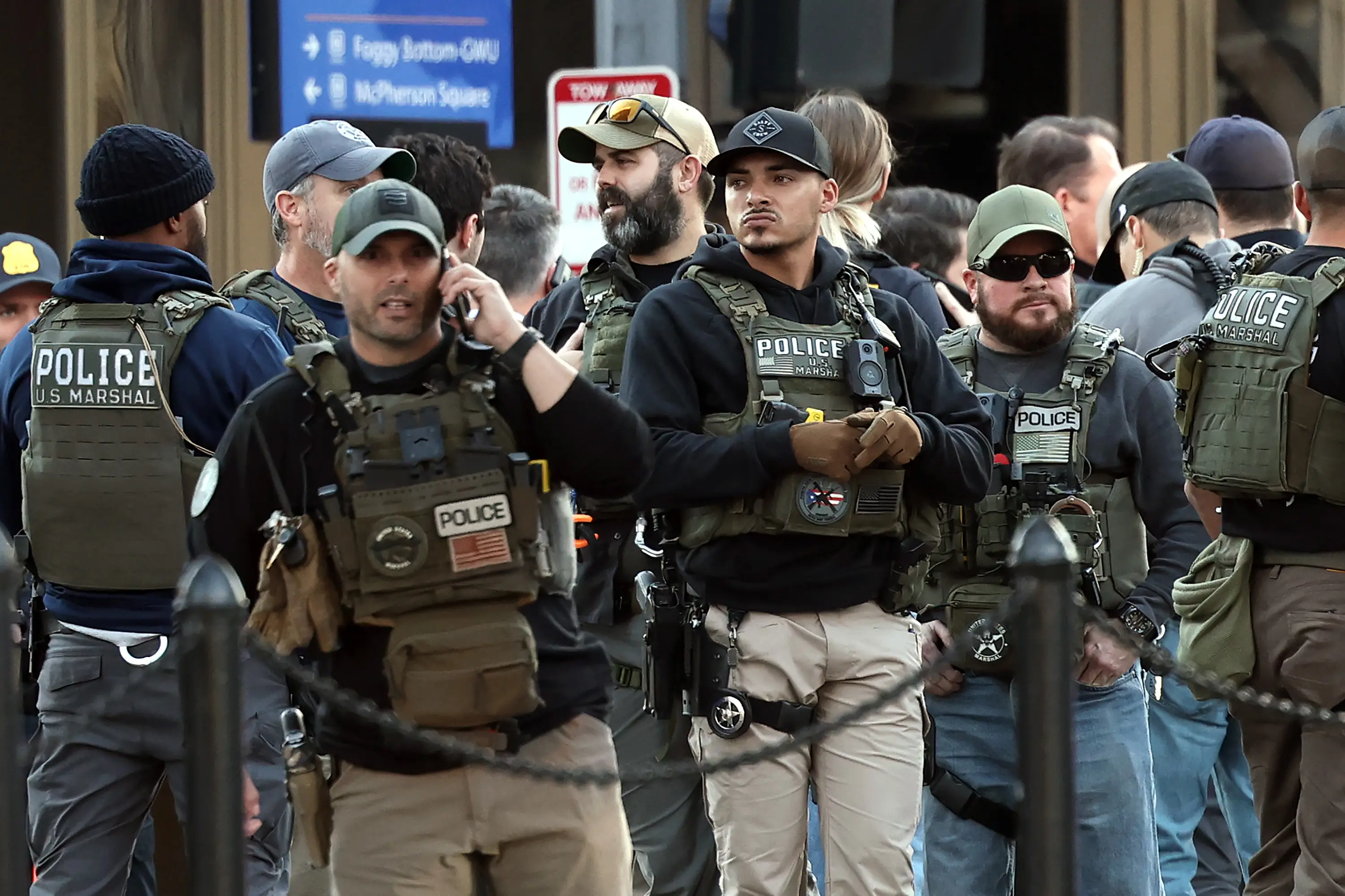 Members of law enforcement, including the U.S. Marshals, respond to a shooting near the White House (Win McNamee / Getty Images)