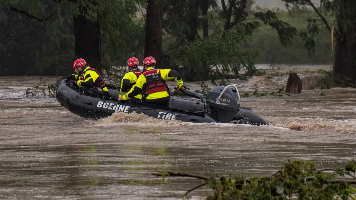 At least 24 dead and more than 20 children missing after US summer camp is swept away by extreme floods