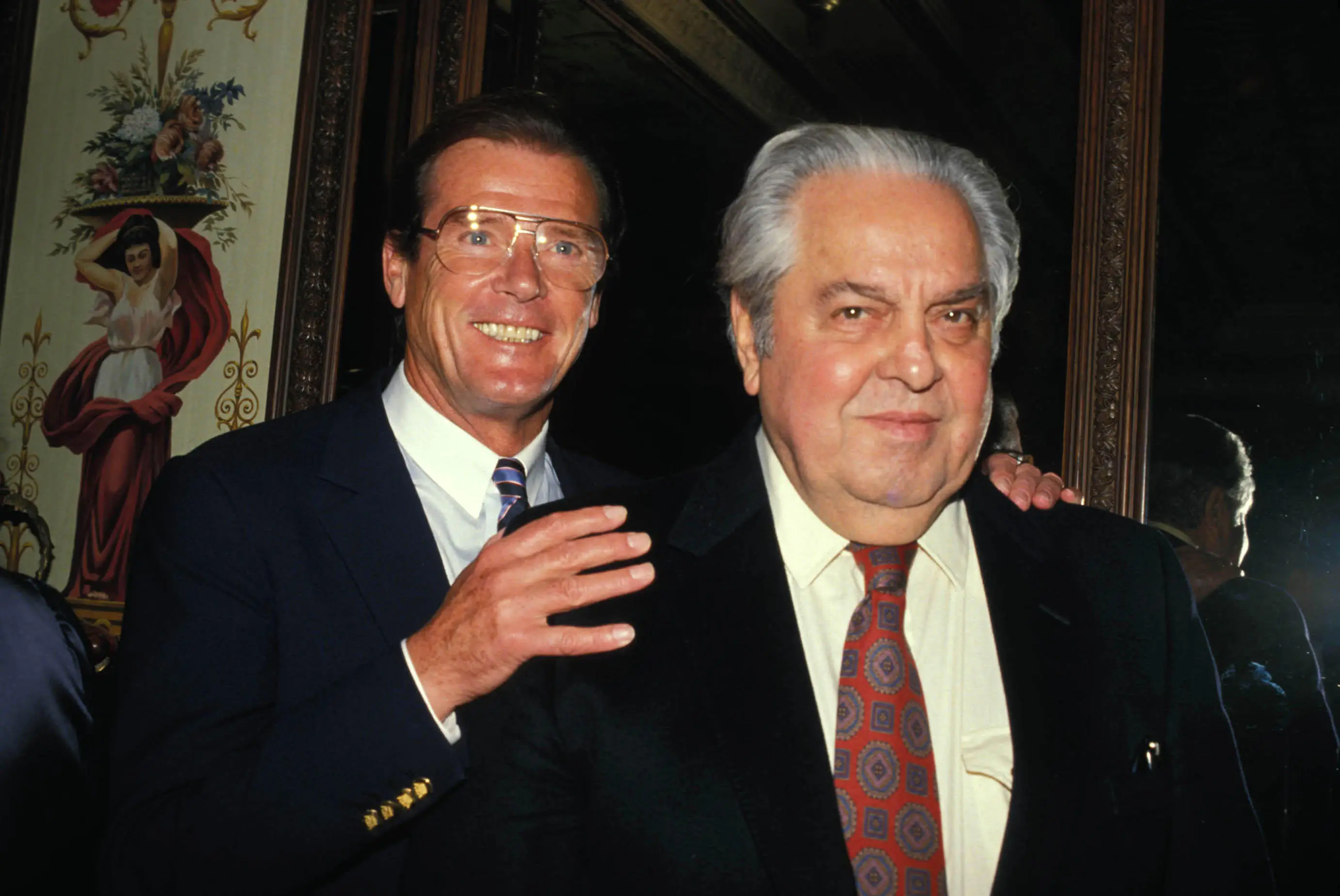 Cubby Broccoli and James Bond's Roger Moore.