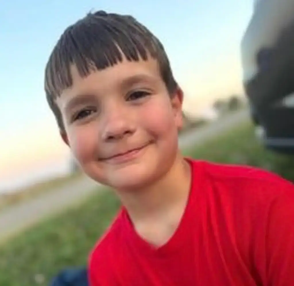 Leland "Lee" Arnett, eight, suffered catastrophic head injuries after allegedly being struck with a baseball bat at his family's home in De Soto (