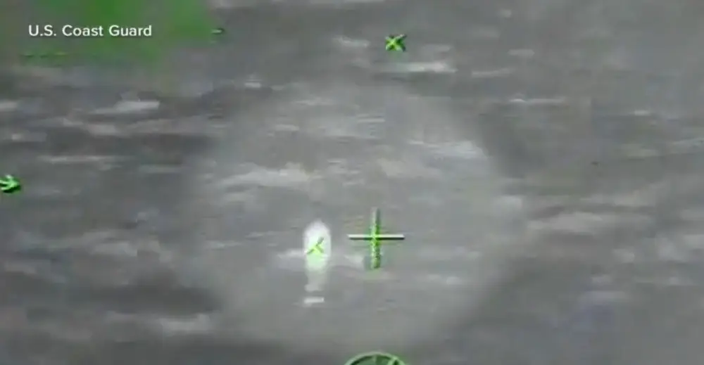 The 28-year-old fell into shark-infested waters.