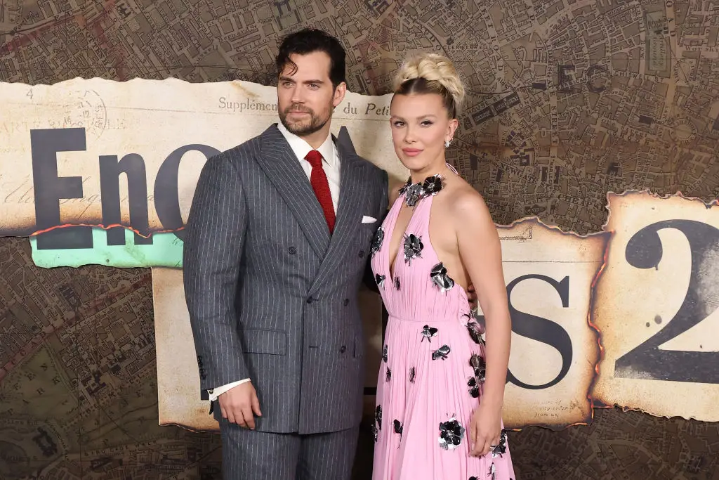 Millie Bobby Brown and Henry Cavill at the premiere for Enola Holmes 2 in 2022 (Taylor Hill/FilmMagic)
