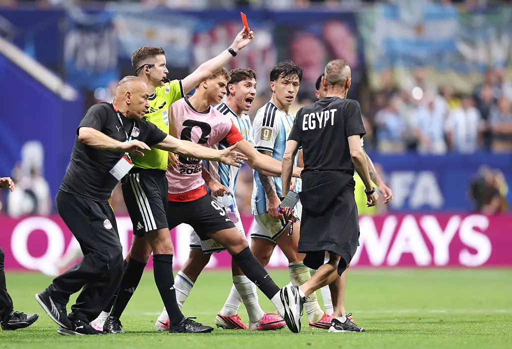 Goalkeeper coach Saafan El-Sagheer was shown a red card, and manager Hassan had to be pulled away from a heated confrontation with referee Francois Letexier. (Photo by Steph Chambers - FIFA/FIFA via Getty Images)