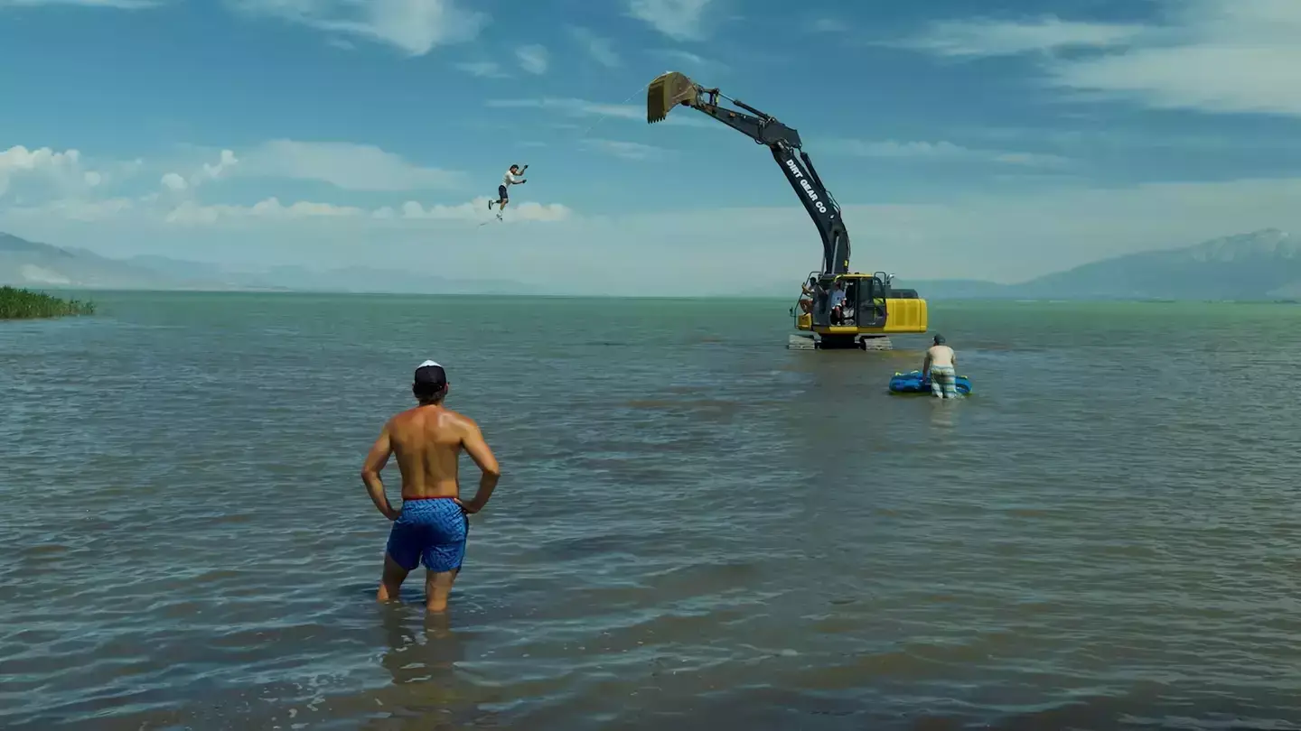 The 2020 event saw several influencers - known as the 'Vlog Squad' - swung around on a rope attached to a crane over water (YouTube/ Jeff Wittek)