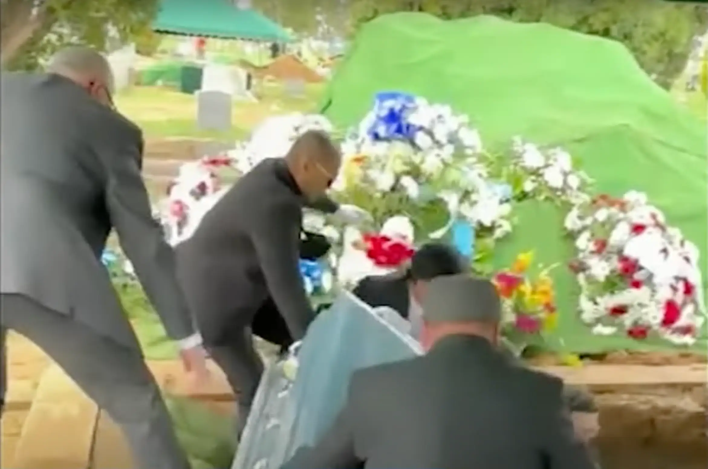 Pallbearers fell into Aviles' grave at his funeral (YouTube/6abc Philadelphia)