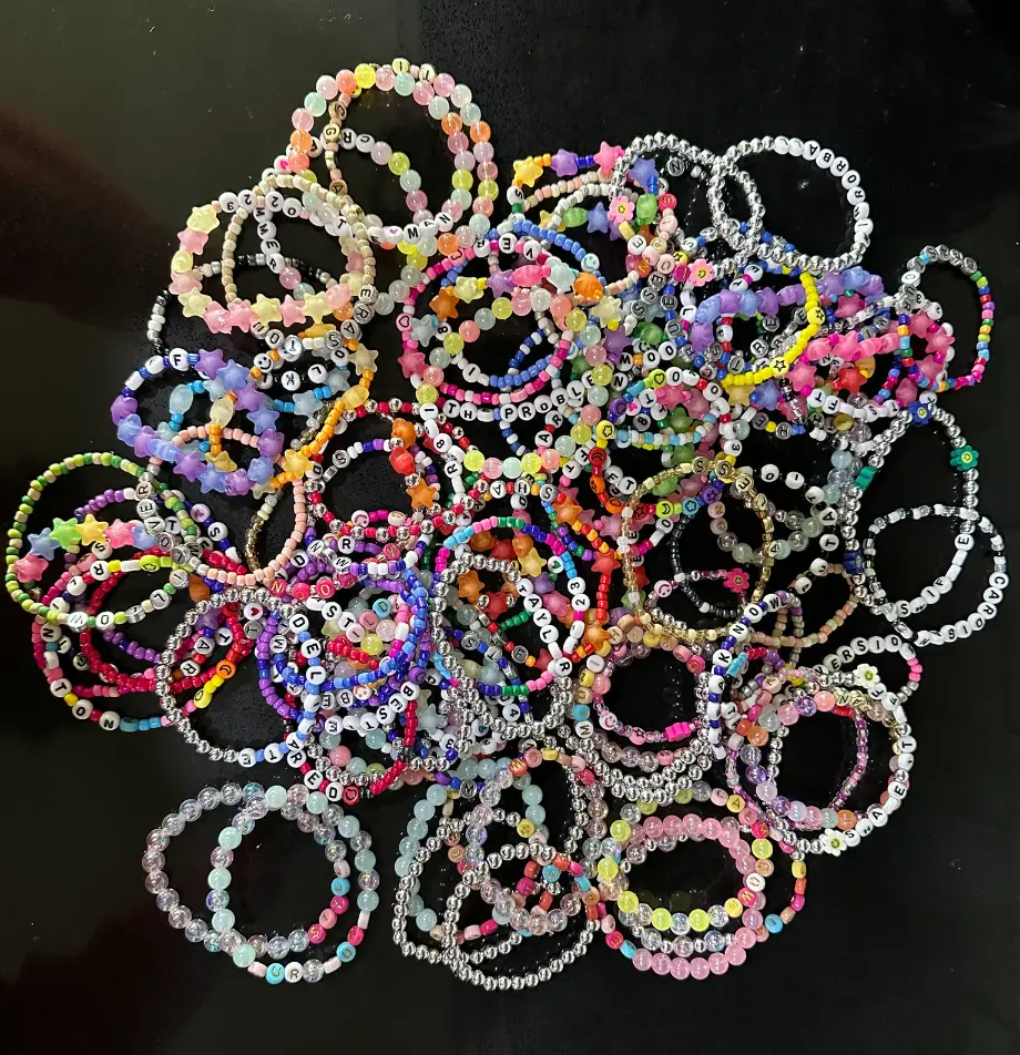 Jamie Tompkins makes dozens of Taylor Swift-themed bracelets.