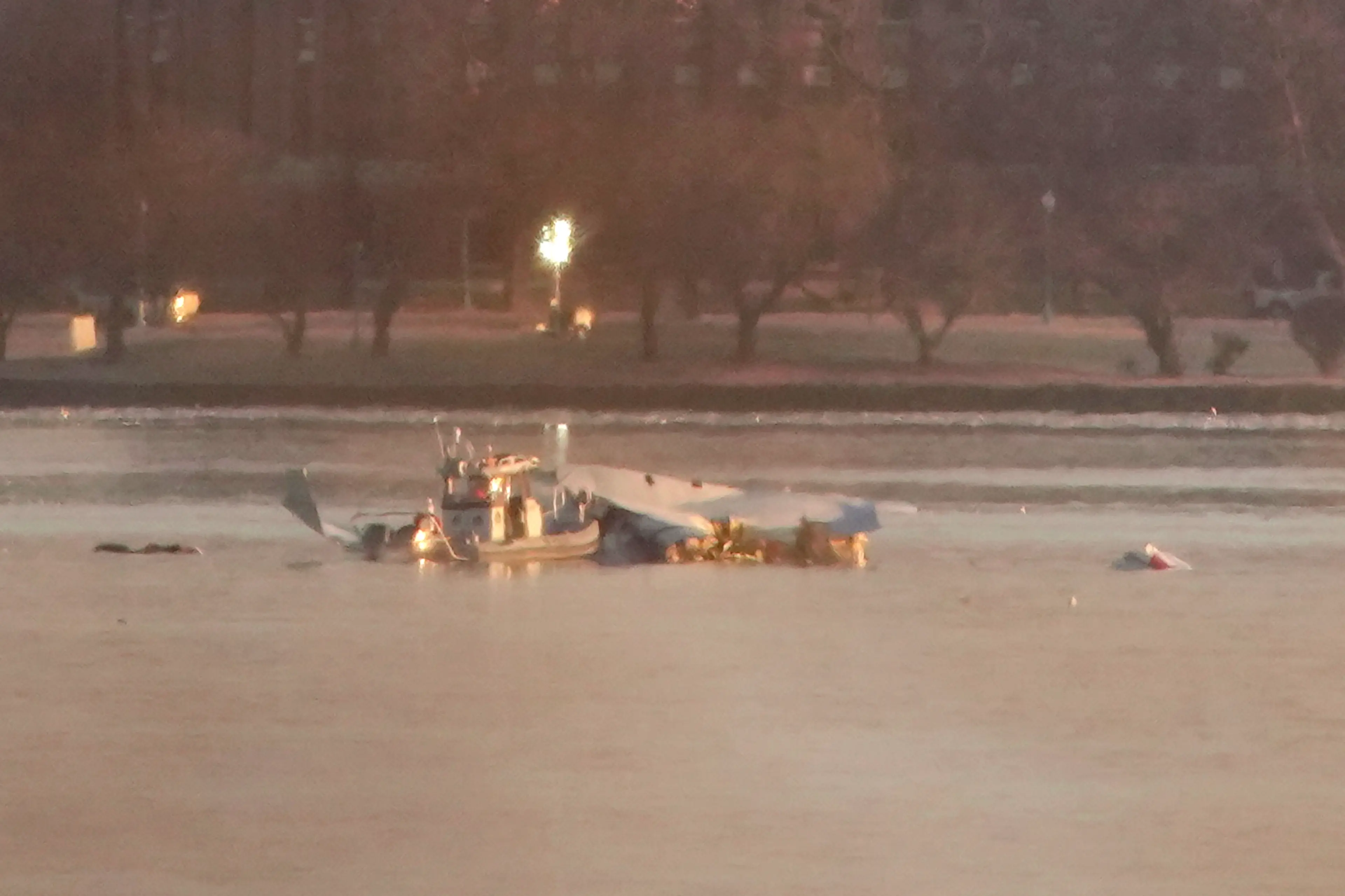 Parts of the American Airlines plane are now visible in the Potomac River (Andrew Harnik/Getty Images)