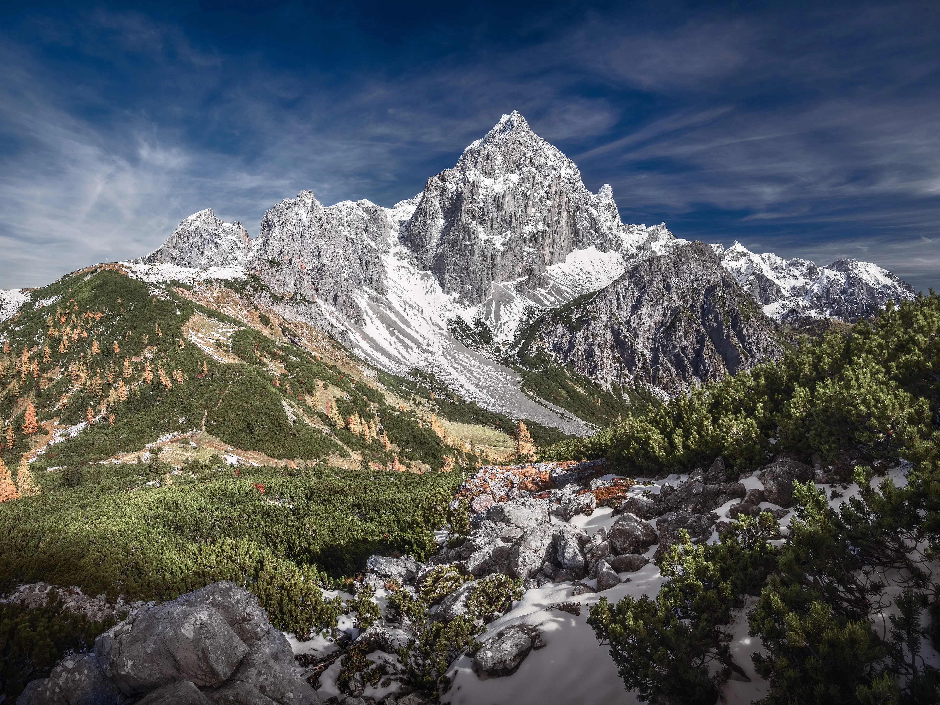 The Dachstein Mountains are popular with tourists and climbers alike.