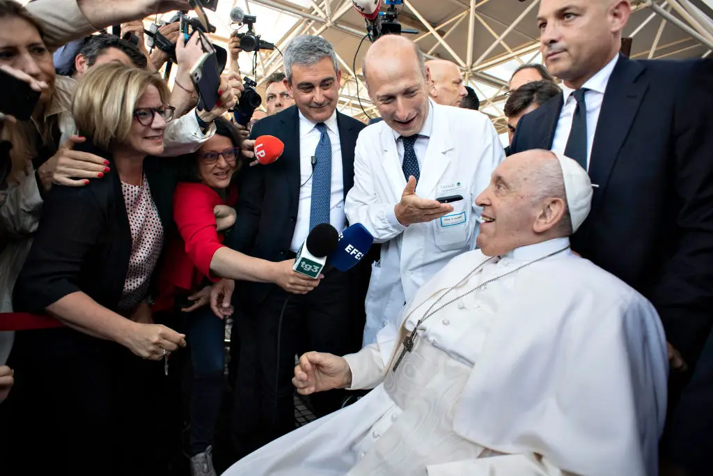 Dr Sergio Alfieri seen with Pope Francis in 2023 (Vatican Media via Vatican Pool/Getty Images)