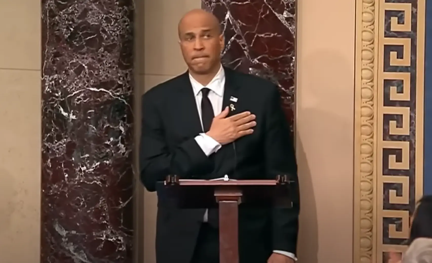 He covered his heart with his hand when he realised he had broken the record (CBS)