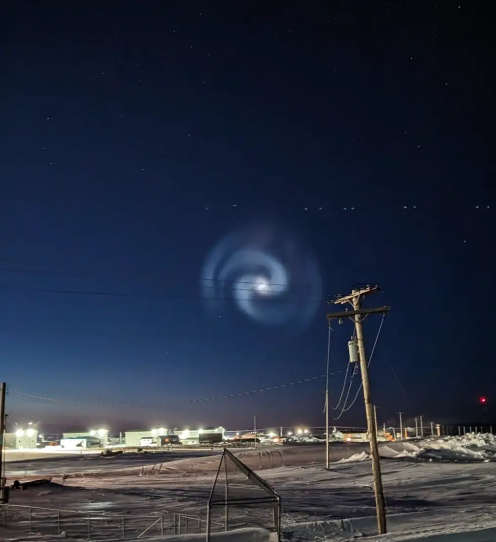 A mysterious giant spiral has left people in search of catching a glimpse at the famed northern lights utterly baffled.