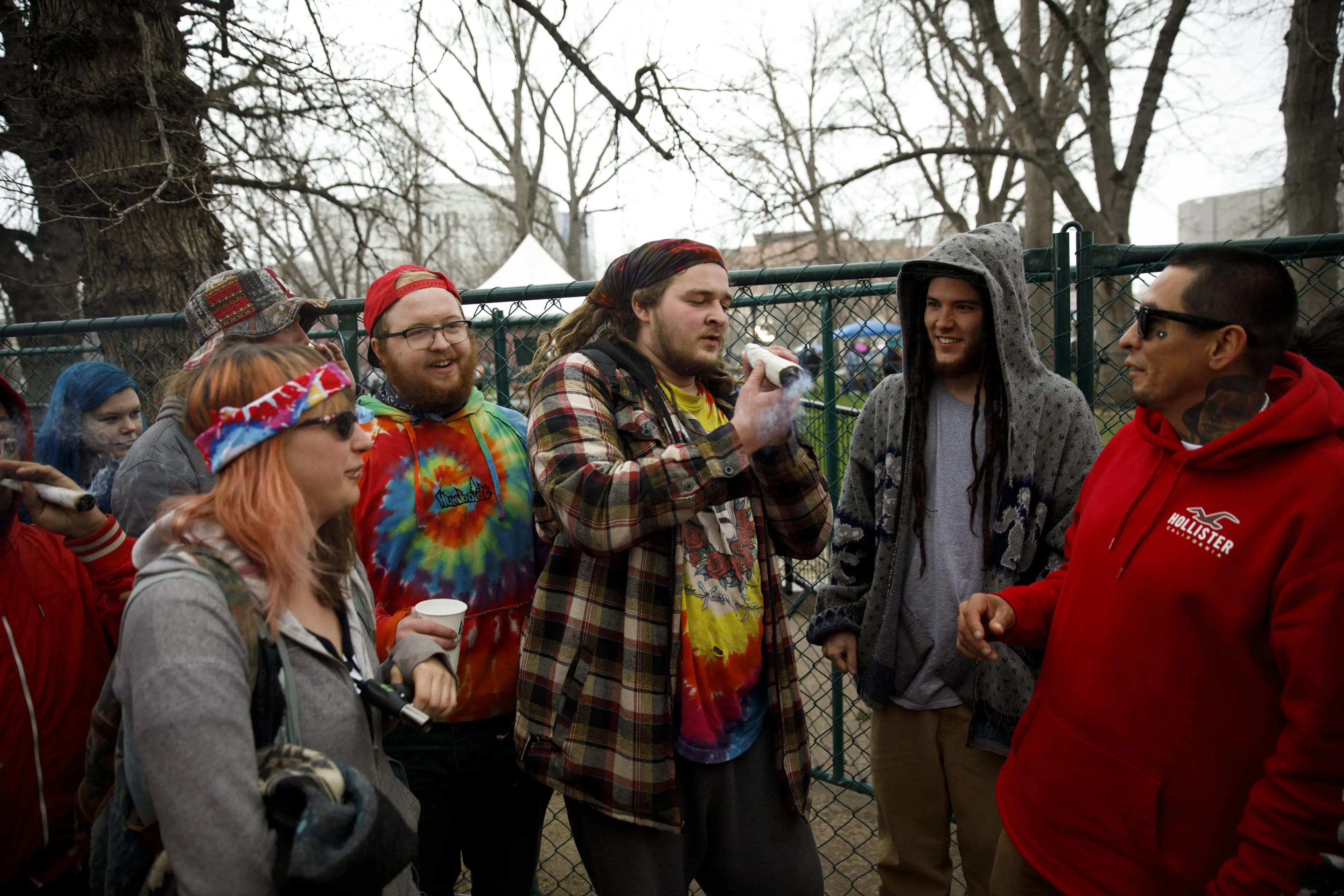 People smoke at the Mile High 420 Festival in Denver, Colorado.
