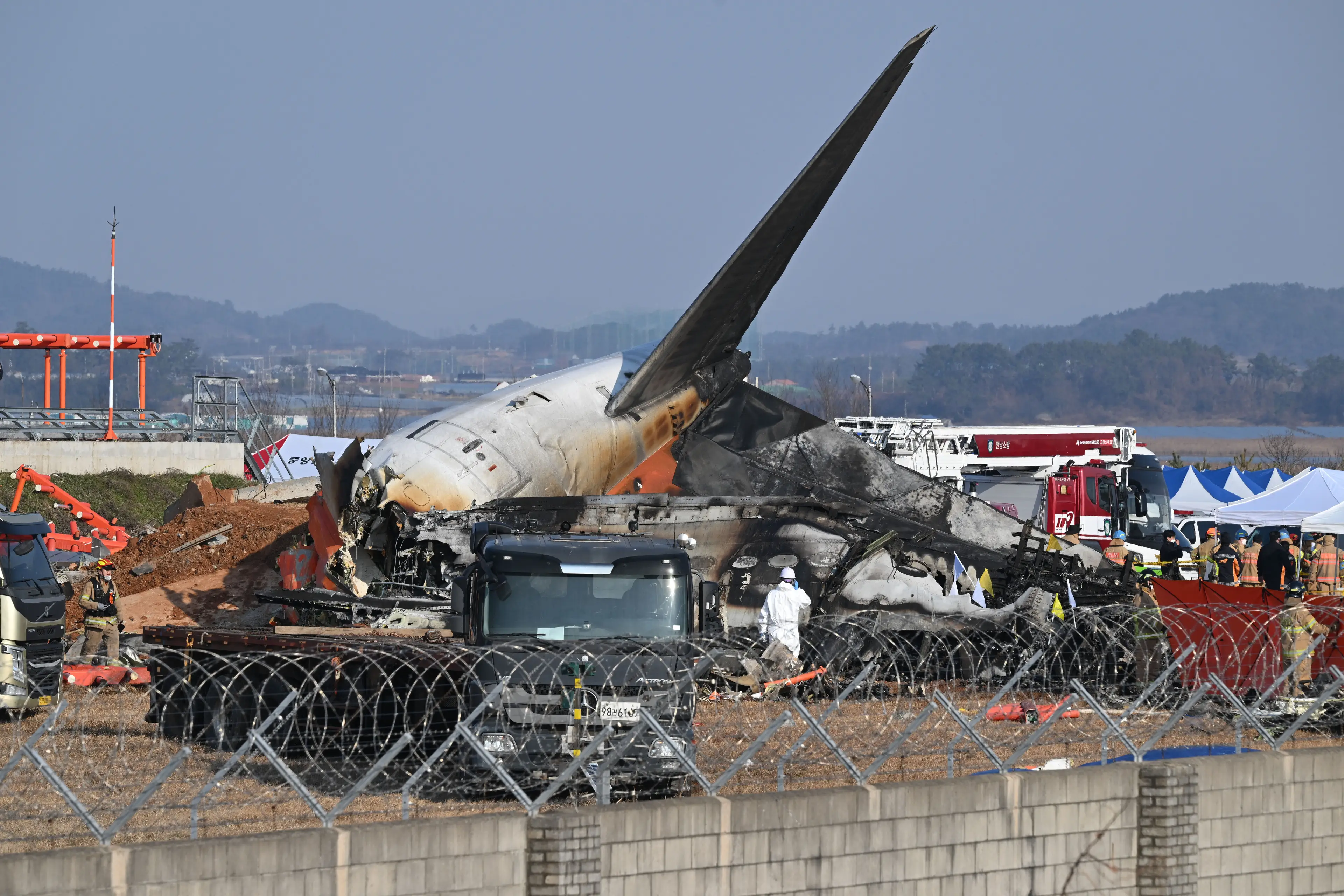 Only two people surived the plane crash and are now in hospital (JUNG YEON-JE/AFP via Getty Images)