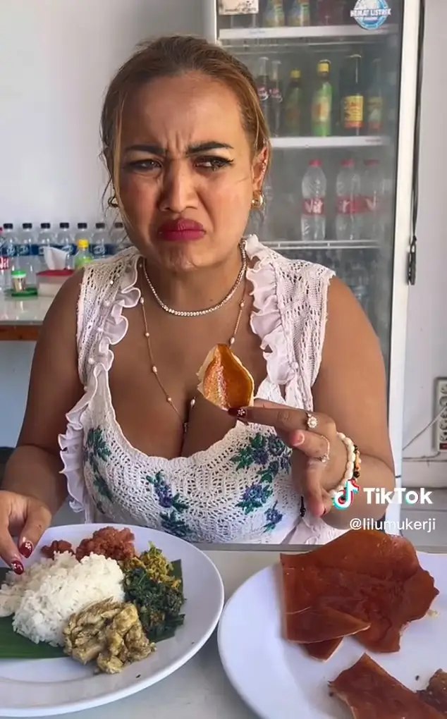Lina Lutfiawati posted a video of herself eating pork to TikTok.
