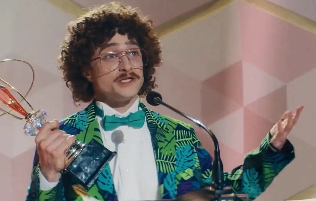 Daniel Rafcliffe as Weird Al Yankovic in Weird: The Al Yankovic Story.