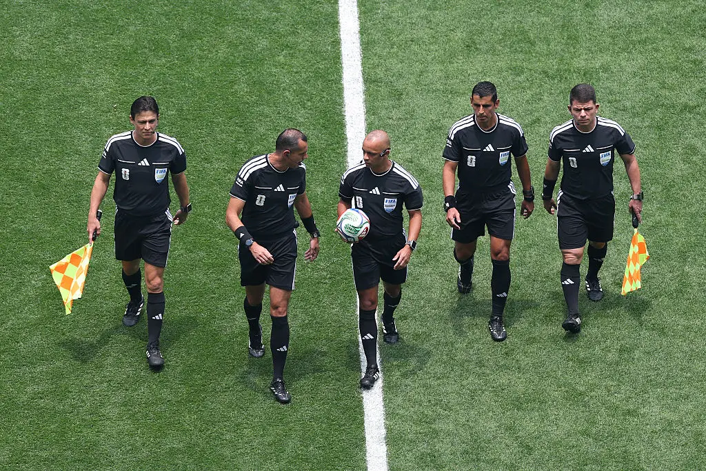 Referee Wilton Sampaio (C) and match officials take to the pitch before the FIFA World Cup 2026 Group A match between Mexico and South Africa at Mexico City Stadium on June 11, 2026 in Mexico City, Mexico. (Photo by Kevin C. Cox/Getty Images)