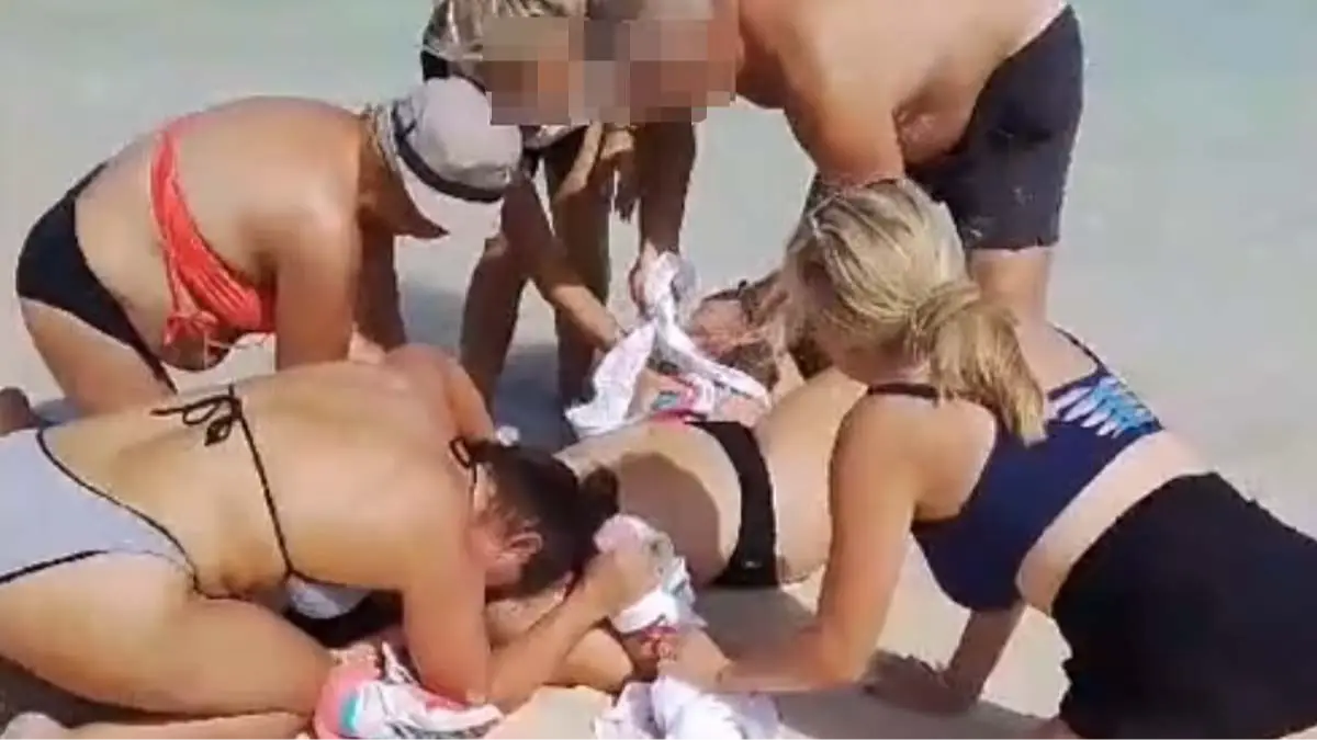 Authorities issue warning after tourist has both hands bitten off by shark while trying to take picture of it