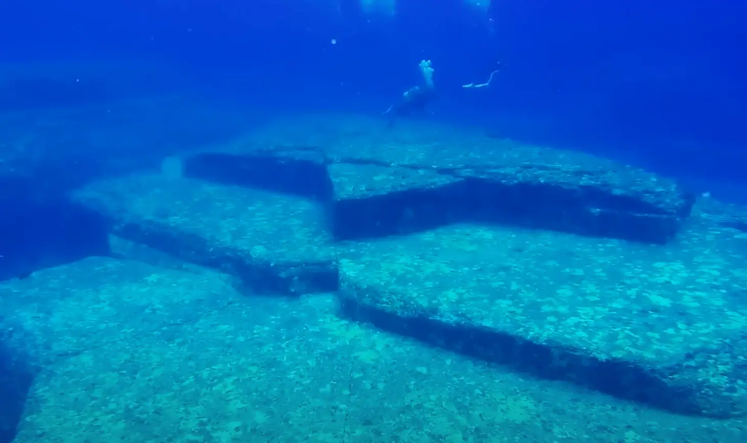 It's long been debated whether the monument was natural or man-made (YouTube/@PADI_JP)