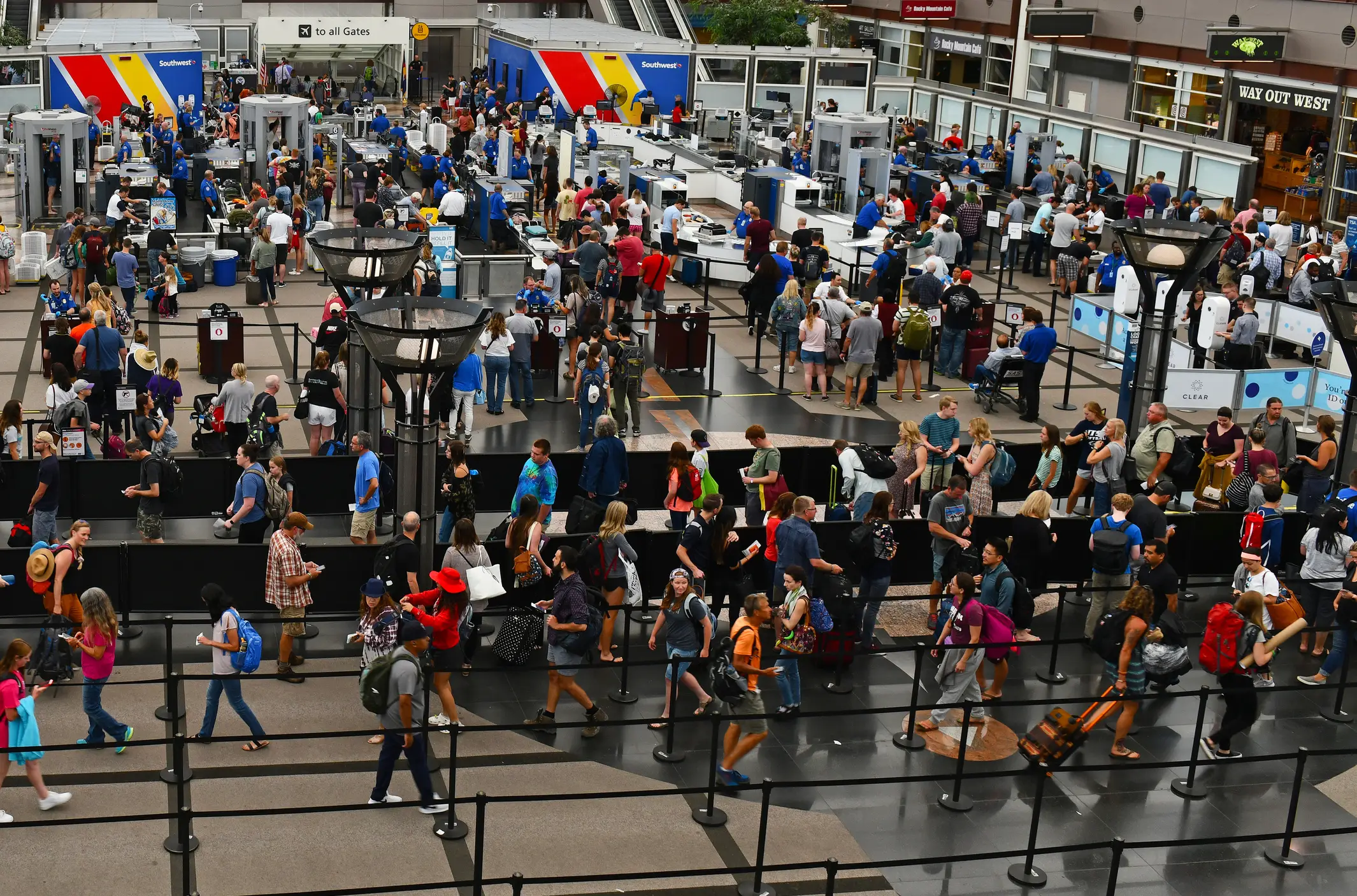 The queues at airport security can get a bit sweaty for all of us (Getty Stock Image)