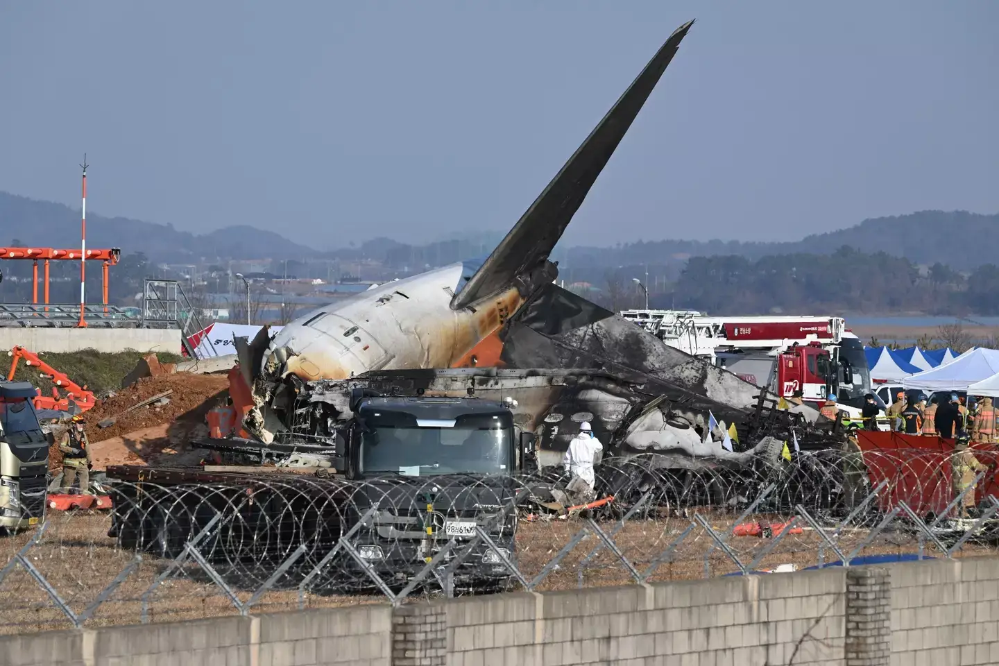 Only two people surived the plane crash and are now in hospital (JUNG YEON-JE/AFP via Getty Images)