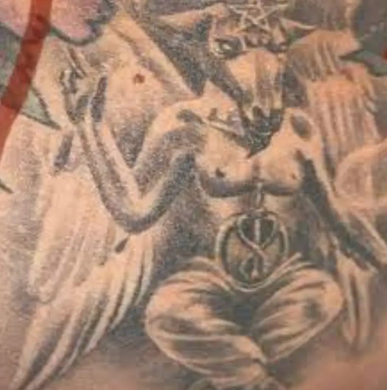 She has Baphomet tattooed on her hip.