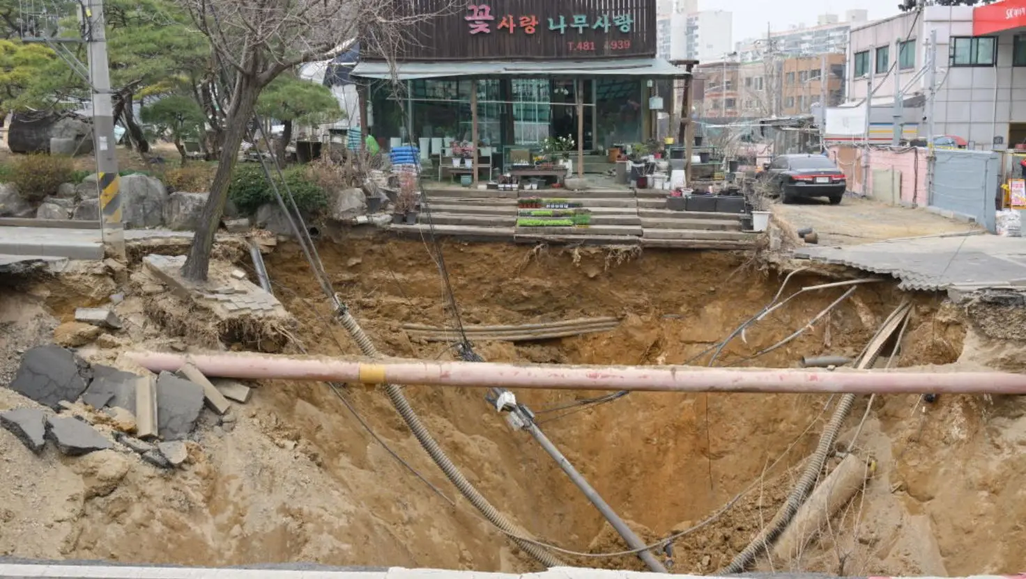 The sinkhole claimed the life of the 33-year-old motorcyclist (ANTHONY WALLACE/AFP via Getty Images)