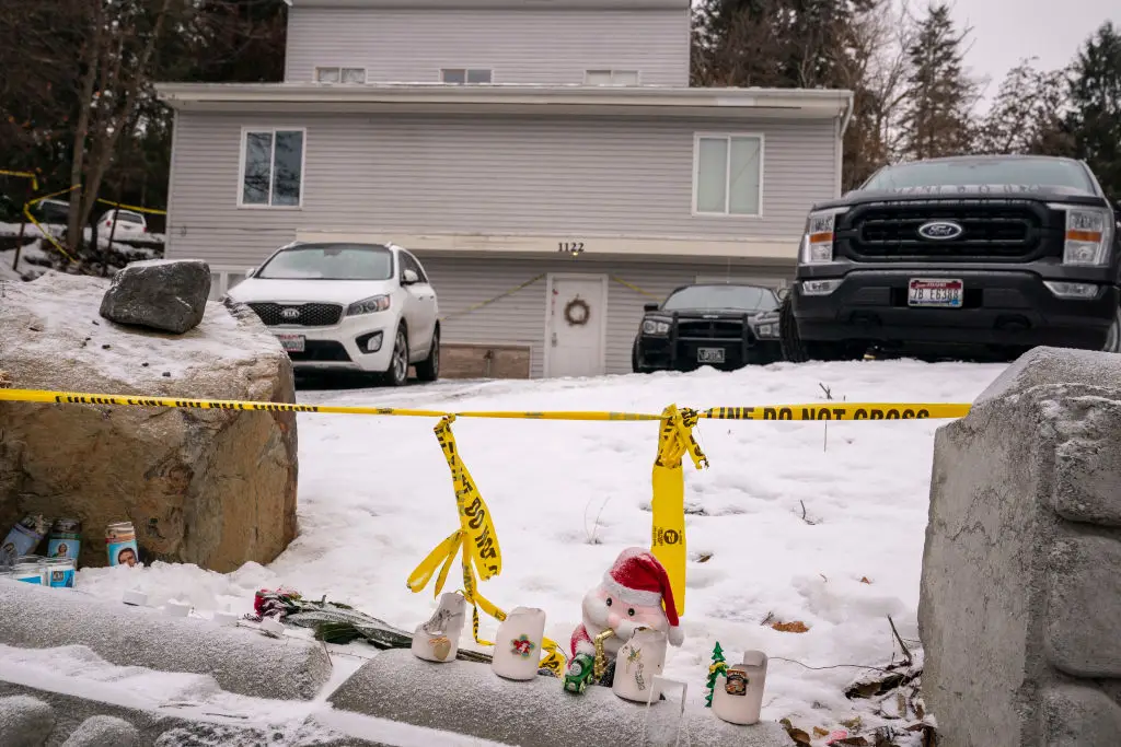 A make-shift memorial set up near the victims' home where they were murdered (David Ryder/Getty Images)