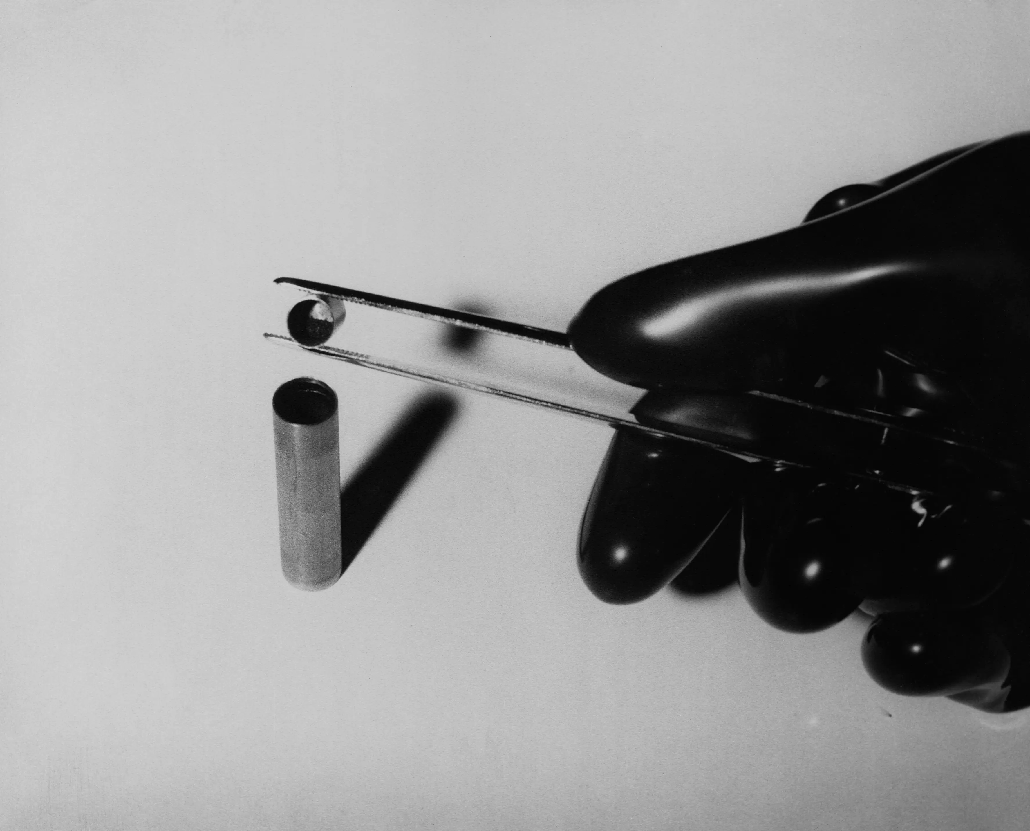 Radioactive material being poured into a capsule (CORBIS/Corbis via Getty Images)