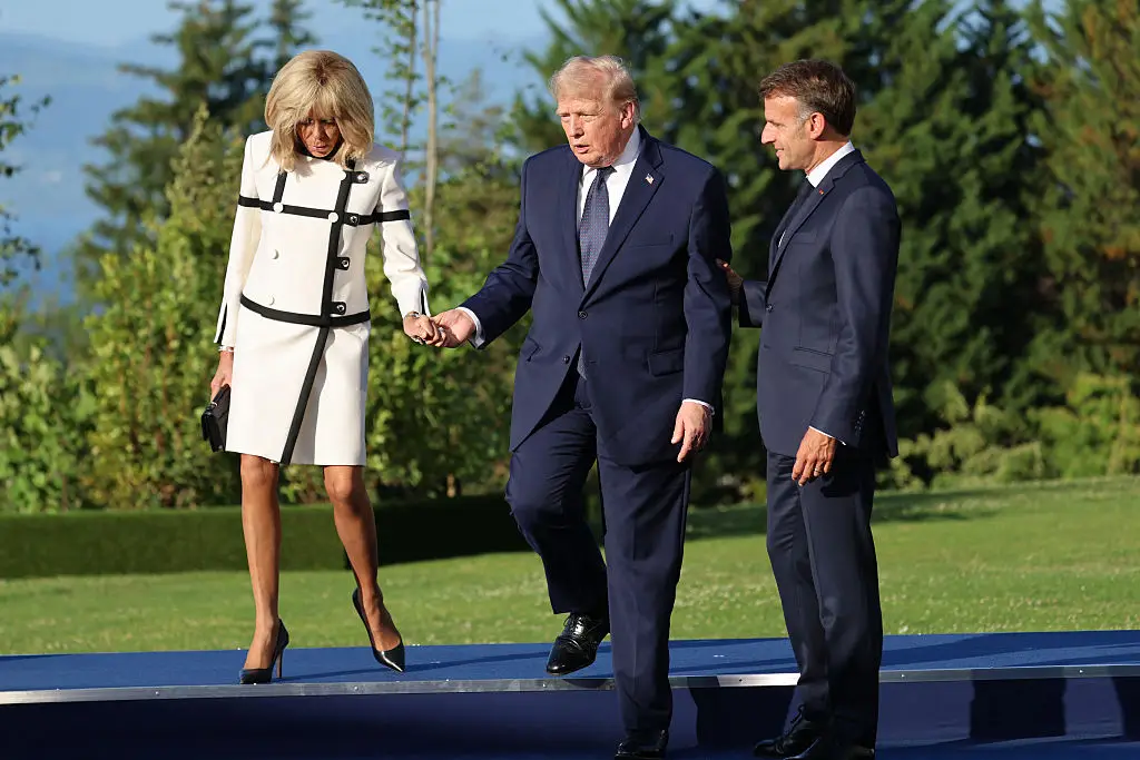 People are calling the interaction between the pair 'awkward' (Photo by Ludovic MARIN / AFP via Getty Images)