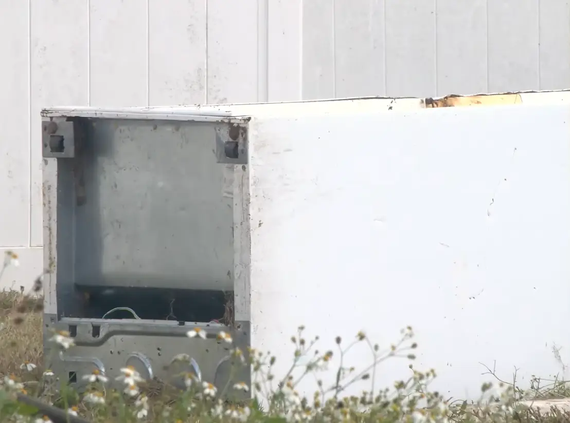 The body had been left in the abandoned freezer.