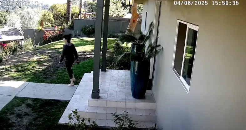 Shriner could be seen from her yard with a handgun (Los Angeles Police Department/YouTube)