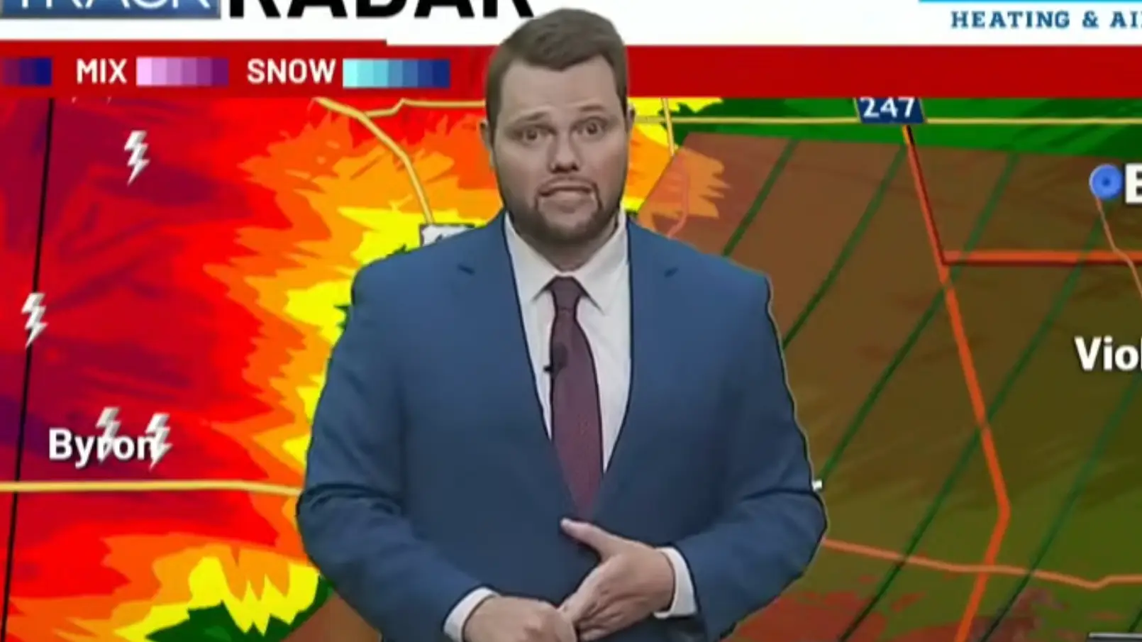 Shocking moment meteorologist texts wife on live TV during severe weather update