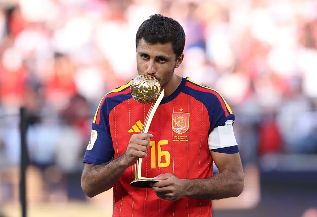 Spain captain Rodri kissing the World Cup trophy (Carl Recine/Getty Images)
