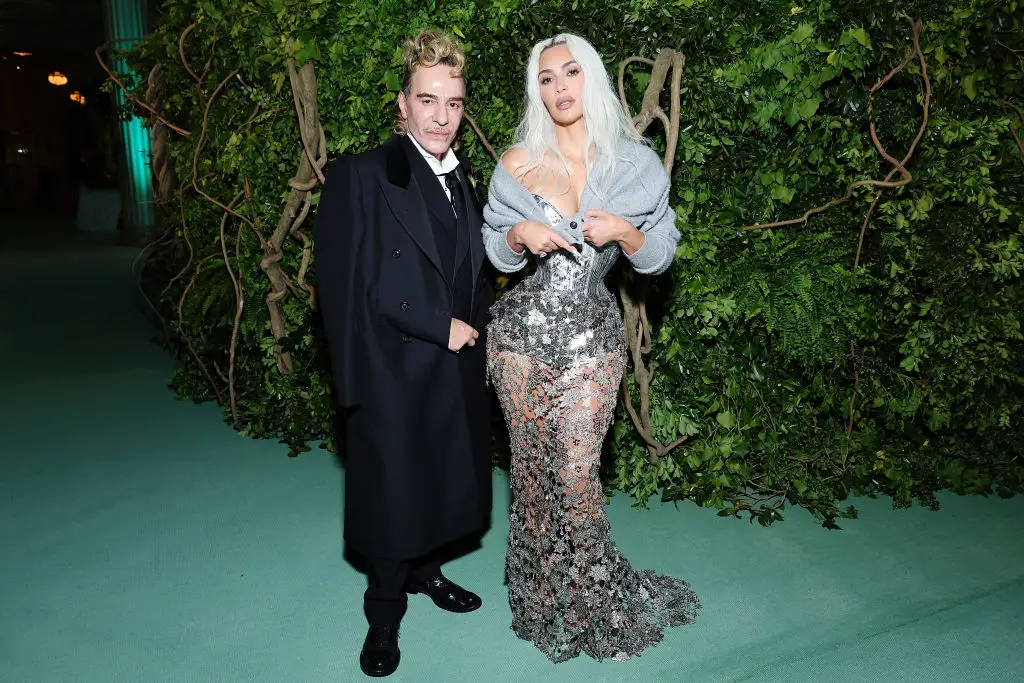 John Galliano pictured Kim Kardashian at the Met Gala in 2024 (Cindy Ord/MG24/Getty Images for The Met Museum/Vogue)