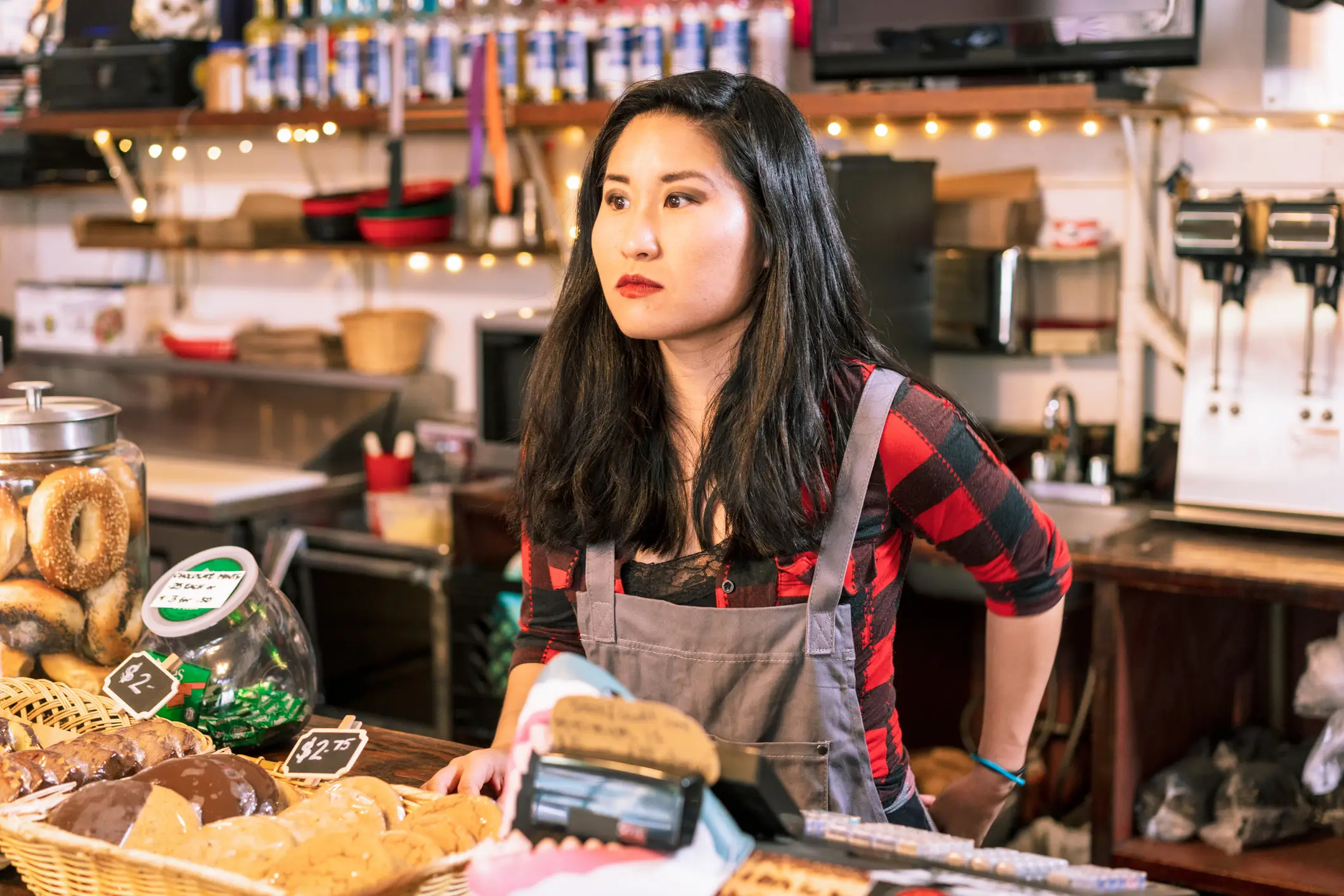 Young store workers are being accused of being rude for not replying when someone says 'hi', 'bye' or 'thank you' (Getty stock)