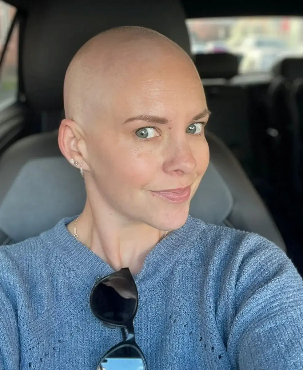 Rachel noticed her back pain in December 2024 (SWNS)